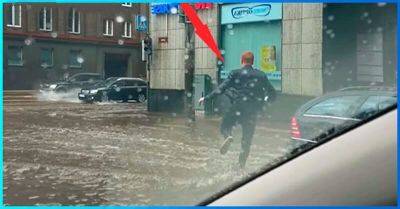 Парень выбежал из машины в сильный ливень, чтобы совершить поступок, на которые другие не решились - leprechaun.land